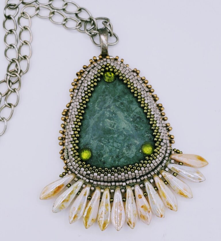 Thirteen daggers pendant on a silver chain